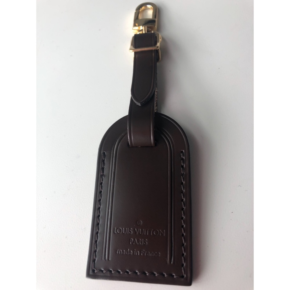 Authentic Louis Vuitton small luggage tag